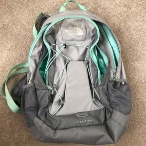 Gray and Aquamarine NorthFace backpack